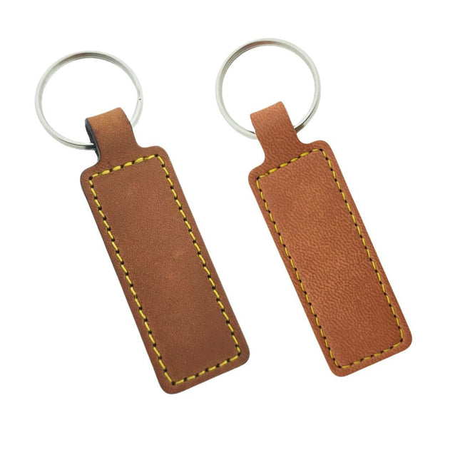 Porte-clés en cuir ou cuir synthétique - 23 x 59 mm - par pièce