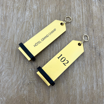 Porte-clés hôtel Boomerang or personnalisé - aluminium -  100 x 30 mm - par pièce