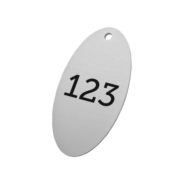 Jeton numéroté argenté en aluminium anodisé ovale - 85 x 45 mm - par pièce
