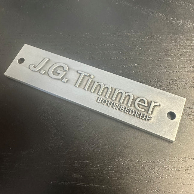 Logo métallique - 80 x 19 mm - par pièce