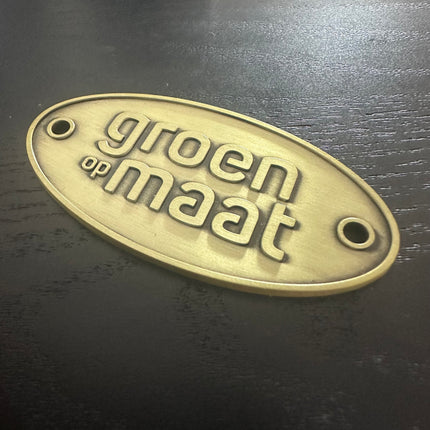Logo métallique - 70 x 35 mm - par pièce