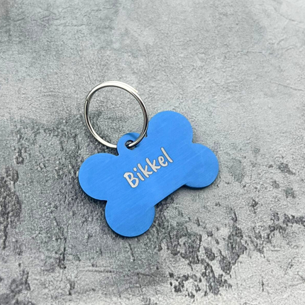 Médaille chien os en aluminium - 38 x 28 mm