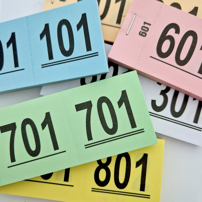 Carnets de tickets de tombola et tickets de vestiaire avec 10 carnets avec 100 doubles numéros