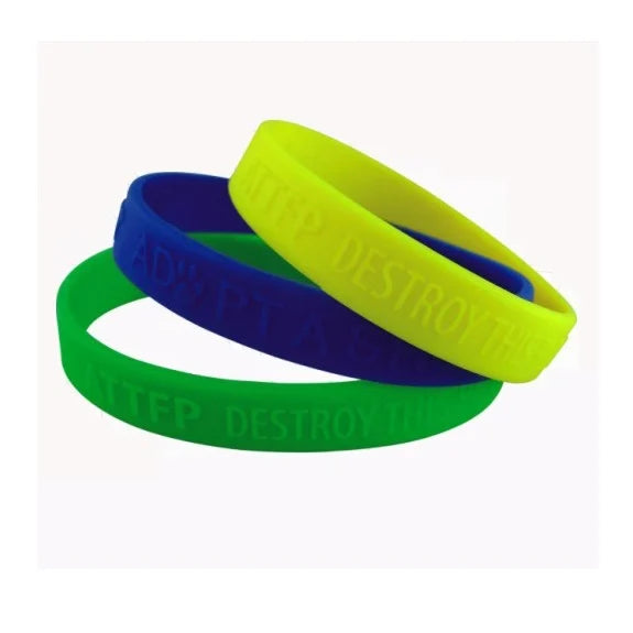 Bracelets en silicone avec propre texte gravé en relief - par pièce