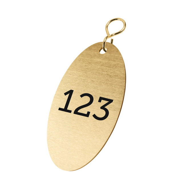 Porte-clés numéroté en laiton ovale - 85 x 45 mm - par pièce