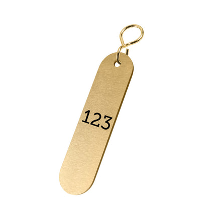 Porte-clés numéroté en laiton ovale - 72 x 28 mm - par pièce